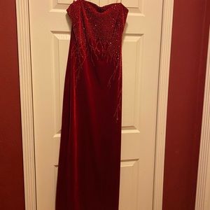 Long red velvet gown with beaded detail.. size 6 JS Boutique.